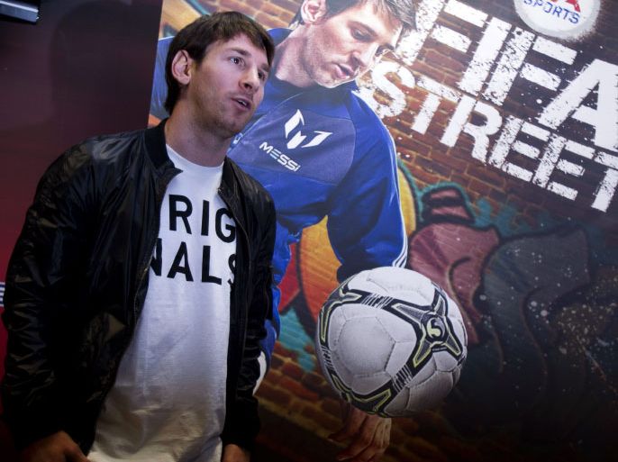 epa03142181 FC Barcelona's Argentinian striker Lionel Messi is seen during the presentation of a charity project of his foundation in Barcelona, Spain, 12 March 2012. Messi said that coach Josep Guardiola is more important for FC Barcelona than himself and the club would be quite different without Guardiola as head coach. EPA/ALEJANDRO GARCIA