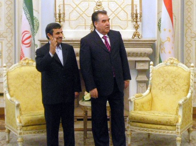 Iranian President Mahmoud Ahmadinejad (L) meets with Tajikistan's President Emomali Rakhmon in Dushanbe on March 24, 2012. Ahmadinejad and his Afghan and Pakistani counterparts have a meeting in Tajikistan to mark Noruz (Persian new year) and to discuss Afghan economy. AFP PHOTO/STR