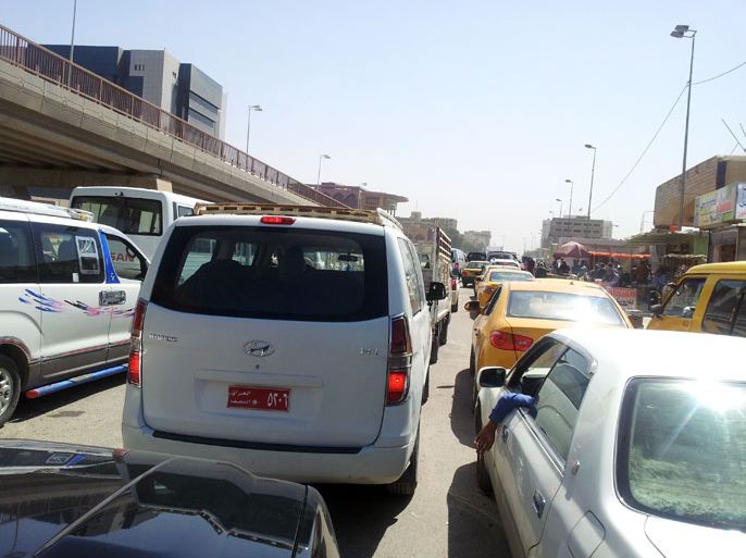 الزحام المروري ببغداد - القمة تغرق بغداد بفوضى مرورية - كريم حسين - بغداد