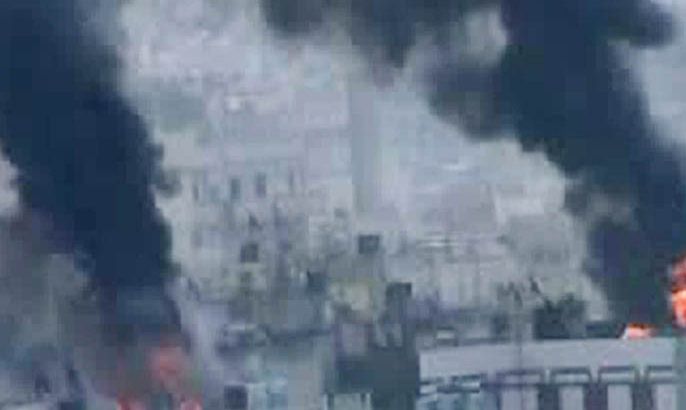 An image grab taken from a video uploaded on YouTube on March 26, 2012, shows smoke billowing from reported shelling by Syrian government forces on a residential area in the flashpoint central city of Homs,