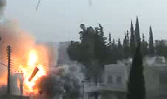 An image grab taken from a video uploaded on YouTube on March 13, 2012, allegedly shows shelling by regime forces in Maaret al-Numan in the restive Idlib province, located near the Turkish boarder