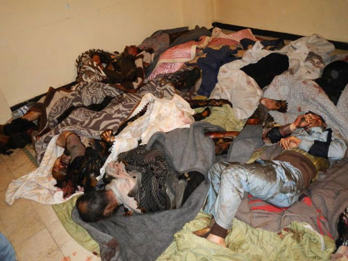 ‪مجزرة حمص راح ضحيتها نحو 50 طفلا وامرأة‬ (الفرنسية)