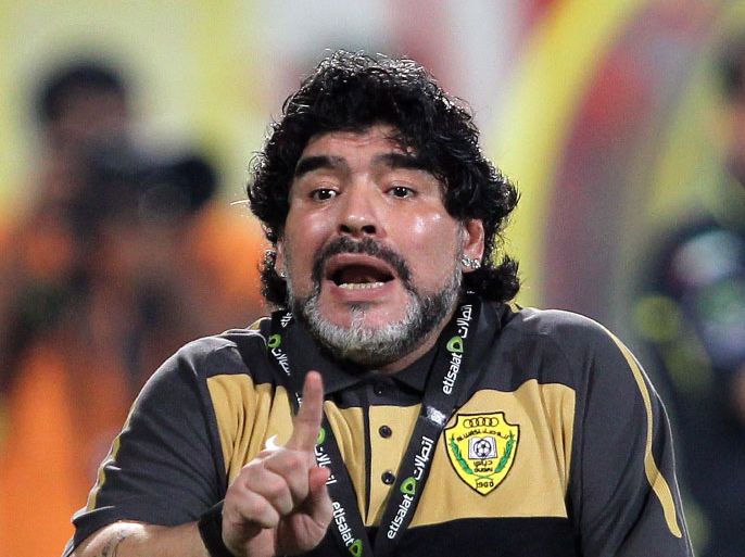 epa03060950 (FILE) A file picture dated 16 October 2011 shows Al-Wasl Club's head coach Diego Maradona during the Etisalat Pro-League soccer match against Al-Sharjah Club at Al-Wasl Club stadium in Dubai, United Arab Emirates. Diego Maradona was admitted to a hospital 15 January 2012 in the Gulf emirate Dubai to undergo surgery to have kidney stones removed, sources close to the Argentinian football coach said. EPA/ALI HAIDER *** Local Caption *** 00000402969272