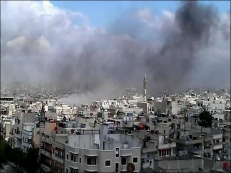 قصف سابق استهدف حييْ الخالدية والحميدية في حمص (الجزيرة-أرشيف)