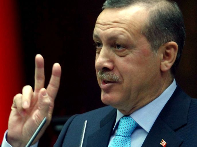 Turkey's Prime Minister Recep Tayyip Erdogan gestures during an address to members of parliament from the ruling AK Party (AKP) at the Turkish parliament in Ankara on April 3, 2012. AFP