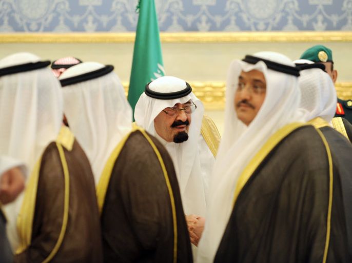 Saudi King Abdullah bin Abdul Aziz shakes hands with arriving delegations during a welcoming ceremony for Gulf Cooperation Council (GCC) leaders attending a summit in Riyadh on May 14, 2012. Gulf leaders will discuss a Saudi proposal to develop their six-nation council into a union, likely to start with the kingdom and unrest-hit Bahrain. AFP