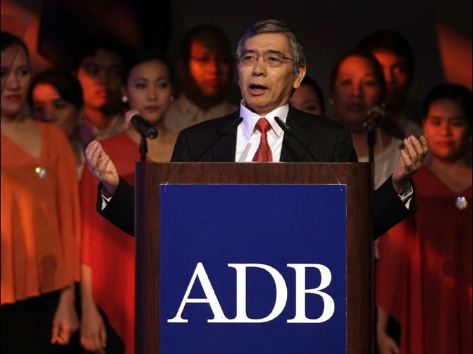epa03205544 Asian Development Bank (ADB) President Haruhiko Kuroda delivers his speech during the Opening Session of the Asian Development Bank (ADB) Annual Meeting of Board of Governors in Manila, Philippines, 04 May 2012. Asia-Pacific countries were urged to strive for economic growth that would not leave anyone behind in poverty and protect the environment despite risks from a weak global economy. While growth in the Asia-Pacific region is strong, Kuroda said successful economies must be inclusive, green and knowledge-led. EPA/FRANCIS R. MALASIG