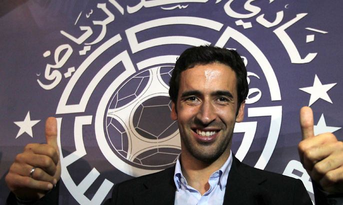 Doha, -, QATAR : Spanish striker Raul gives thumbs up during a ceremony where he was unveiled as a new player for Qatar's Al-Sadd in Doha on May 13, 2012. The 34-year-old former Real Madrid star left German side Schalke 04 after two seasons in Gelsenkirchen. AFP PHOTO/KARIM JAAFAR