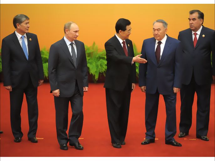 MOW019 - Beijing, -, CHINA : (L-R) Kyrgyz President Almazbek Atambayev, Russian President Vladimir Putin, Chinese President Hu Jintao, Kazakh President Nursultan Nazarbayev and Tajik President Emomali Rahmon attend a meeting at a summit of the Shanghai Cooperation Organization (SCO) in Beijing, on June 7, 2012. Security in Central Asia, including the situation in Afghanistan, is set to be the focus of talks at a meeting in Beijing of a regional group dominated by China and Russia. AFP PHOTO/ RIA-NOVOSTI/ POOL/ ALEXEY DRUZHININ
