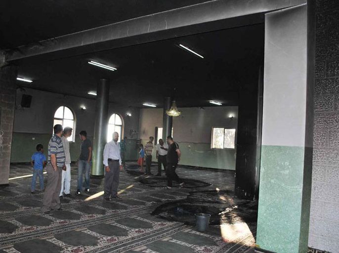 صورة أرشفية لاحراق مسجد قبل شهور قرب رام الله