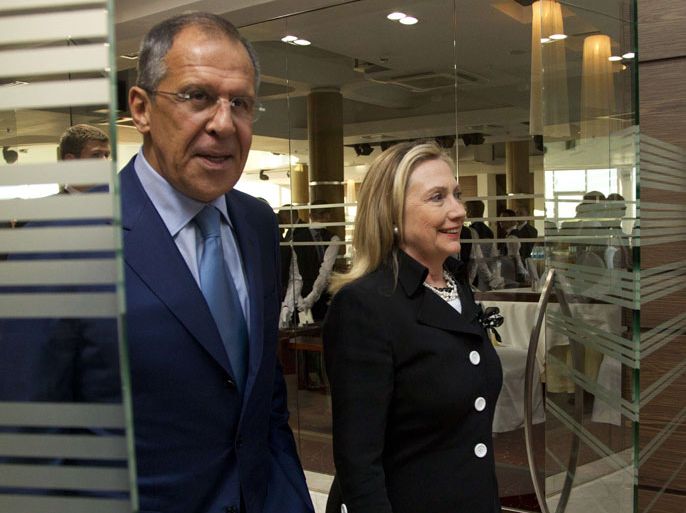 -, RUSSIAN FEDERATION : US Secretary of State Hillary Clinton (R) meets with Russian Foreign Minister Sergey Lavrov in St. Petersburg, on June 29, 2012, on the eve of international talks in Geneva to find a political solution to the Syrian crisis. Clinton met her Russian counterpart Lavrov just one day after he angrily dismissed suggestions that Moscow backed a transition plan which Western powers said was on the agenda for Saturday's talks in Geneva. AFP PHOTO / POOL / Haraz N. Ghanbari