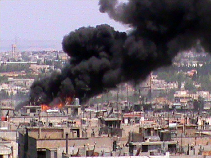 القصف المستمر على حمص يحاصر أكثر من ألف عائلة (الفرنسية-أرشيف)