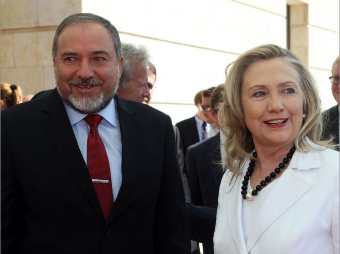 epa03307727 US Secretary of State Hillary Clinton (2-R) meets with Israeli Foreign Minister Avigdor Lieberman (L) in Jerusalem, Israel, 16 July 2012. US Secretary of State Hillary Rodham Clinton landed in Israel overnight for a brief visit, focusing on Israel's tense relations with post-revolution Egypt, Iran and the stalled peace process with the Palestinians. She was scheduled to meet Foreign Minister Avigdor Lieberman, President Shimon Peres, Defence Minister Ehud Barak and Prime Minister Benjamin Netanyahu. It is her first visit for around two years and the last leg of a 12-day tour abroad which included Egypt for her first talks with its new president, Mohammed Morsi of the Muslim Brotherhood. She is also expected to meet acting Palestinian Prime Minister Salam Fayyad in the West Bank. EPA/ABIR SULTAN