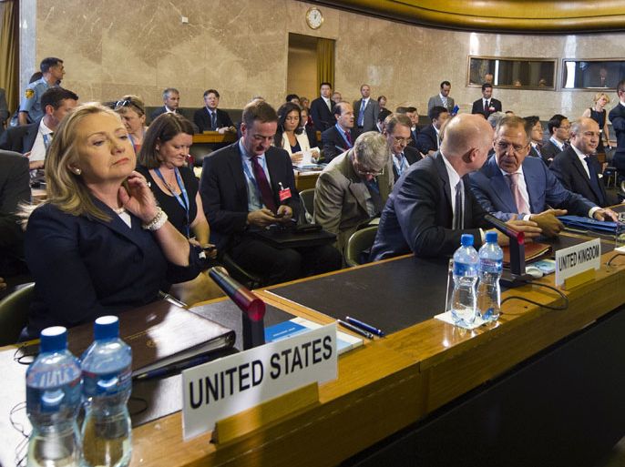 US Secretary of State Hillary Clinton (L) sits next to British Foreign Secretary William Hague (4th R), Russian Foreign Minister Sergei Lavrov (3rd R), and French Foreign Minister Laurent Fabius (2nd R) at the start of a crisis meeting on Syria at the United Nations office in Geneva, on June 30, 2012