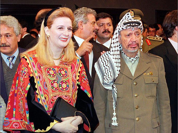 epa02987159 (FILES) A file picture dated 24 November 1994 shows Palestinian leader Yasser Arafat (R), accompanied by his wife Suha before receiving the Principe de Asturias Award in Oviedo, Spain. Tunisia has issued an international warrant for the arrest of Suha Arafat, widow of Palestinian leader Yasser Arafat, the country's justice ministry said 31 October 2011. Kadhem Zine El Abidine, spokesman for the justice ministry, told dpa a Tunis court had issued an arrest warrant for Arafat, but gave no details of the charges. 'I am astonished, badly astonished by these charges. I was a victim of the Tunisian dictatorship, and now I am being accused,' the 48-year-old Arafat told The Times of Malta. EPA/EFE