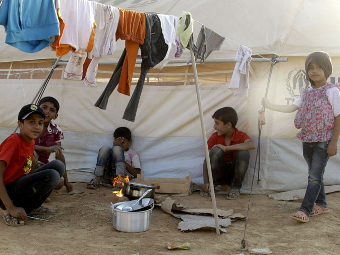 ‪لاجئون صغار في مخيم الزعتري في الأردن‬ (الجزيرة)