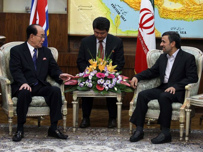Iranian President Mahmoud Ahmadinejad (R) meets with North Korea's ceremonial head of state, Kim Yong-Nam in Tehran on September 1, 2012. The UN nuclear watchdog released a report saying North Korea's nuclear programme was a matter of "serious concern," adding that statements about uranium enrichment and a light-water reactor under construction "continue to be deeply troubling." AFP PHOTO/ATTA KENARE
