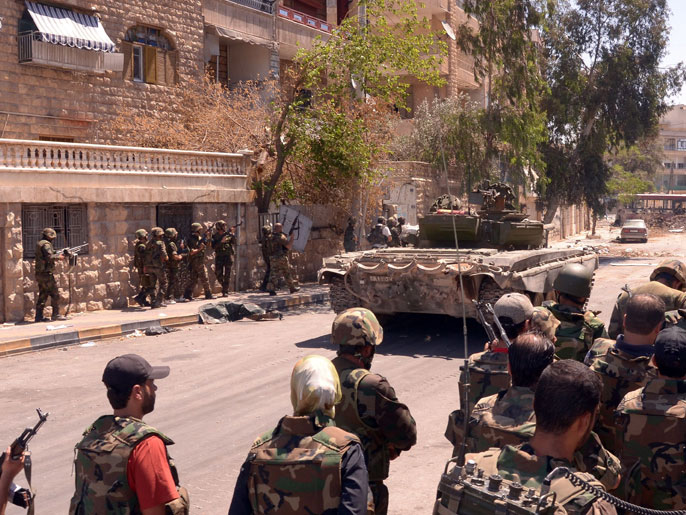 القوات النظامية السورية عززت انتشارها في دمشق ومحيطها (الفرنسية-أرشيف)
