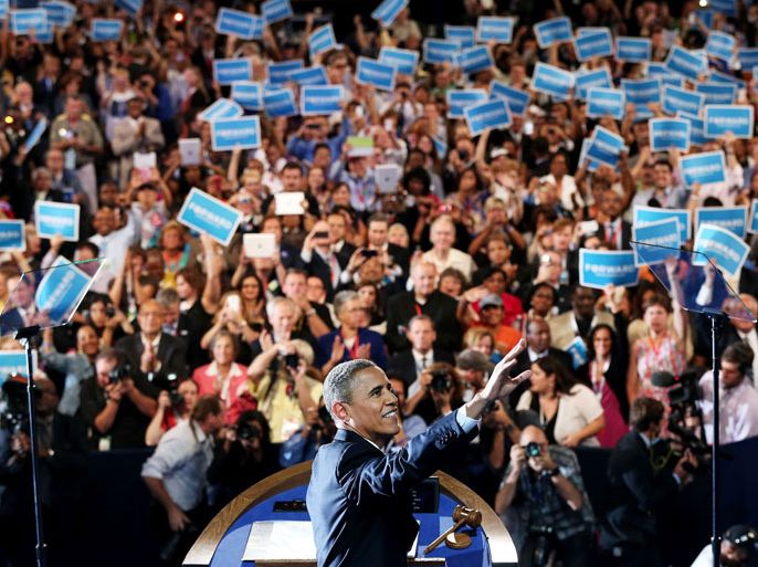 CHARLOTTE, NC - SEPTEMBER 06: Democratic presidential candidate, U.S. President Barack Obama waves on stage as he accepts the nomination for president during the final day of the Democratic National Convention at Time Warner Cable Arena on September 6, 2012 in Charlotte, North Carolina. The DNC, which concludes today, nominated U.S. President