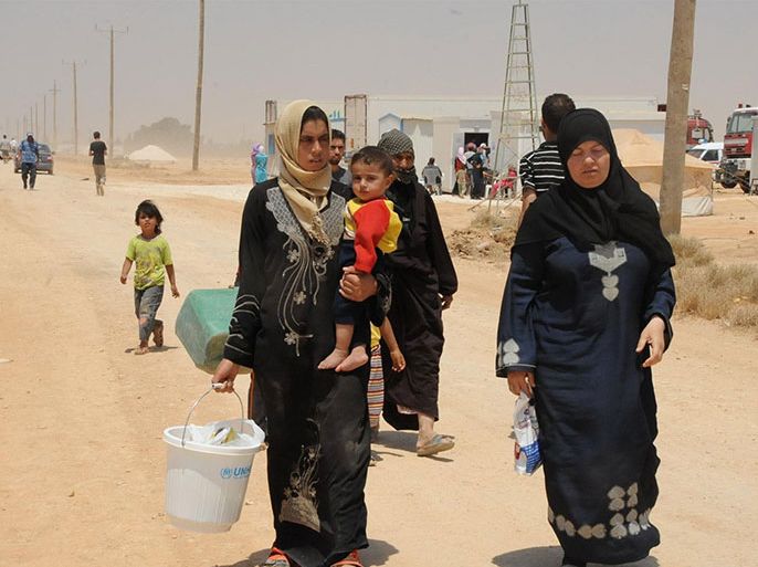 لاجئون سوريون في مخيم الزعتري - ارشيف