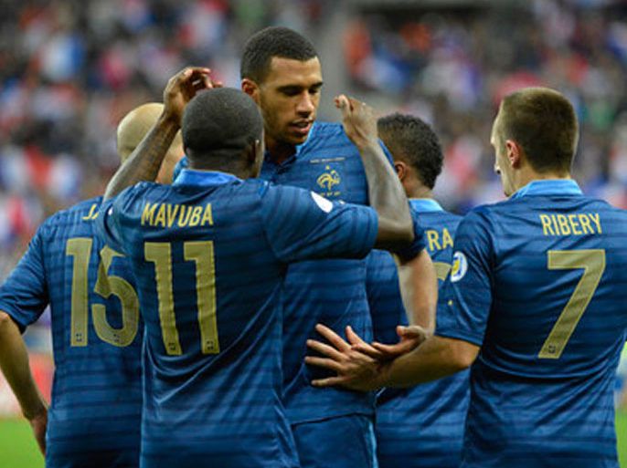 Etienne Capoue (C) of France celebrates with his teammates after scoring the 1-0 against Belarus during the FIFA World Cup 2014 qualification match between France and Belarus at the Stade de France, in Saint-Denis, near Paris, France, 11 September 2012. EPA/STEPHANE REIX
