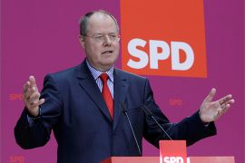 Former German finance minister Peer Steinbrueck and Social Democrat (SPD) member gives a speech at the party headquarters in Berlin September 28, 2012. News on Friday that Peer Steinbrueck, a former finance minister with an acerbic wit, will lead the opposition Social Democrats (SPD) into the 2013 vote will have stirred unease in Chancellor Angela Merkel's entourage, observers say. REUTERS/Tobias Schwarz (GERMANY - Tags: POLITICS)