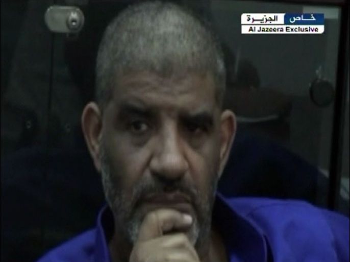 صور خاصة بالجزيرة ليبيا تتسلم من موريتانيا عبد الله السنوسـي رئيـس مخابرات القذافي وتعد بتقديمه لمحاكمة عادلة وعلنية