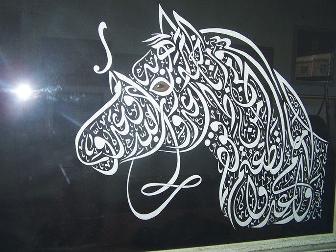 ‪إحدى اللوحات الفنية التي رسمها سعيد النهري‬ إحدى اللوحات الفنية التي رسمها سعيد النهري (الجزيرة)