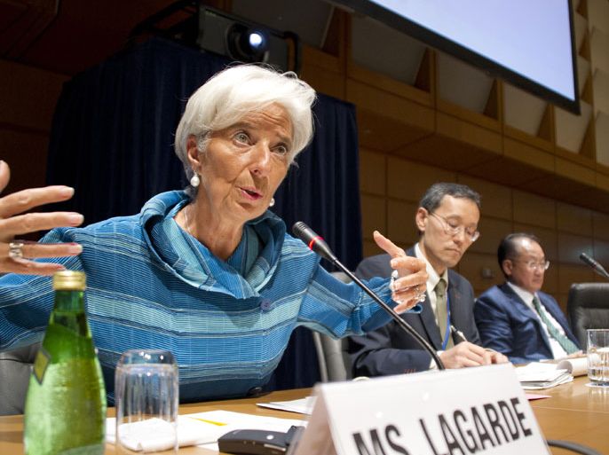 epa03428636 International Monetary Fund (IMF) Managing Director Christine Lagarde speaks during a Civil Society Organizations Townhall meeting at the International Monetary Fund (IMF) and the World Bank Annual Meetings in Tokyo, Japan, 11 October 2012. The head of the IMF called for more time to be allowed for Spain, Portugal and Greece to stabilize their economies. EPA/EVERETT KENNEDY BROWN