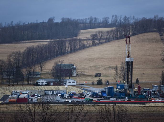 epa03163522 (14/20) A hydraulic fracturing drill rig sits at the base of a valley near Troy, Pennsylvania, USA, 08 March 2012. The controversial drilling practice, also known as fracking, requires injecting huge amounts of water, sand, and chemicals at high pressure thousands of feet beneath the Earth's surface to extract reserves of natural gas. EPA/JIM LO SCALZO PLEASE SEE ADVISORY epa03163507 FOR FULL FEATURE TEXT