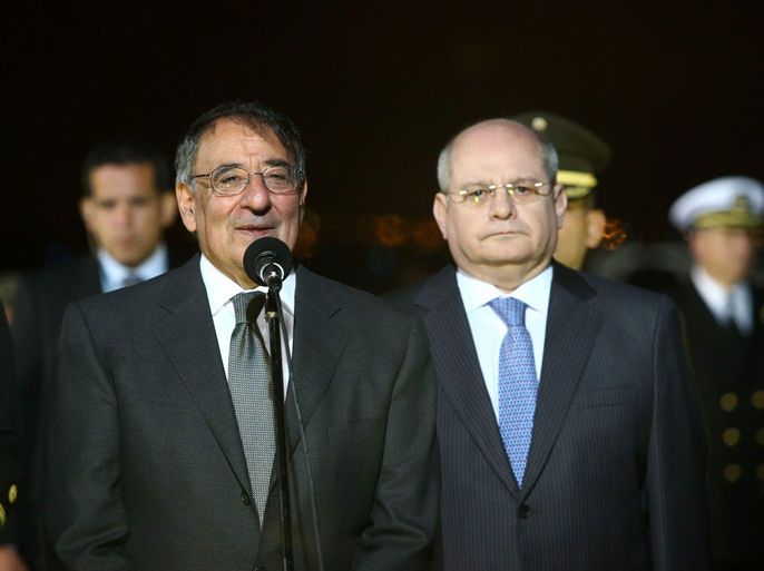 epa03422983 A handout picture provided by the Ministry of Defense of Peru shows US Secretary of Defense, Leon Panetta (L), talking to the press next to his Peruvian counterpart, Pedro Cateriano (R), during the arrival of Panetta for an official visit in Lima, Peru, 05 October 2012. Panetta said that Peru is an important partner for the prosperity and security of the region, previous to his meeting with the Peruvian President Ollanta Humala. EPA/PERU DEFENSE MINISTRY HANDOUT EDITORIAL USE ONLY/NO SALES