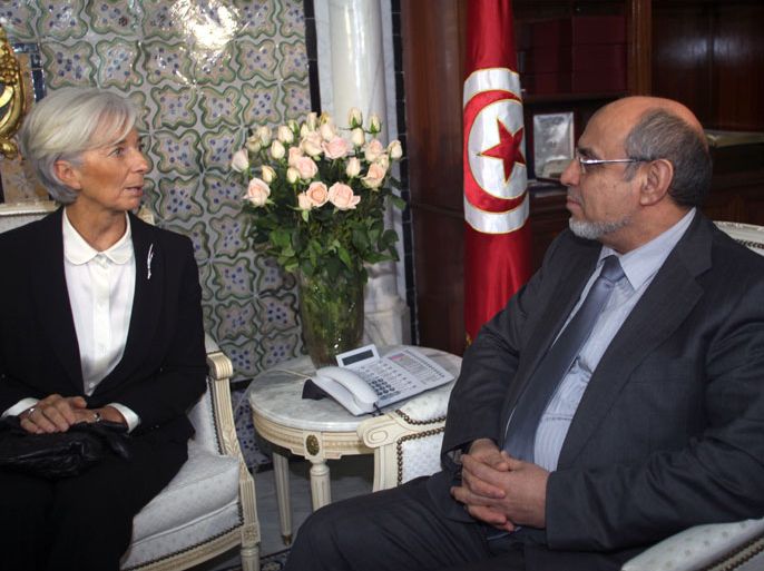 epa03088080 Tunisian Prime Minister Hamadi Jebali (R) meets with Director of the International Monetary Fund (IMF) France's Christine Lagarde in Tunis, Tunisia, 01 February 2012. Lagarde is on a two-day visit to Tunisia during which she will be meeting with a number of high-ranking government officials. EPA/STRINGER