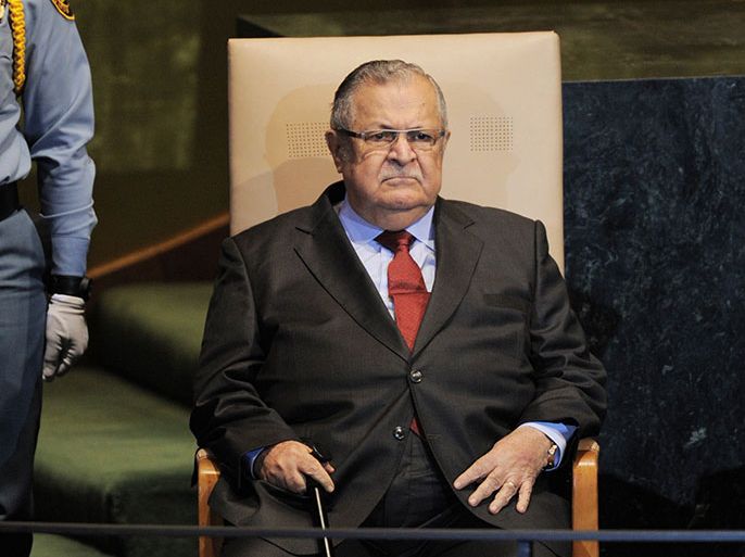 SHX008 - UNITED NATIONS, New York, UNITED STATES : (FILES)--A September 23, 2011 file photo of Jalal Talabani, President of Iraq, sits waiting to address the United Nations General Assembly at UN headquarters in New York. Iraqi President Jalal Talabani has been hospitalised in Baghdad due to a "health emergency," his office said on December 18, 2012. AFP PHOTO/