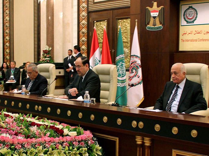 afp : Iraqi Prime Minister Nuri al-Maliki (C) chairs a meeting along side Palestinian prime minister Salam Fayyad (L), and Arab League Secretary-General Nabil Elarabi (R) during the "International Conference in Solidarity with Palestinian and Arab Prisoners and Detainees in the Prisons of the Israeli Occupation" being held in the Iraqi capital Baghdad. AFP PHOTO/STR