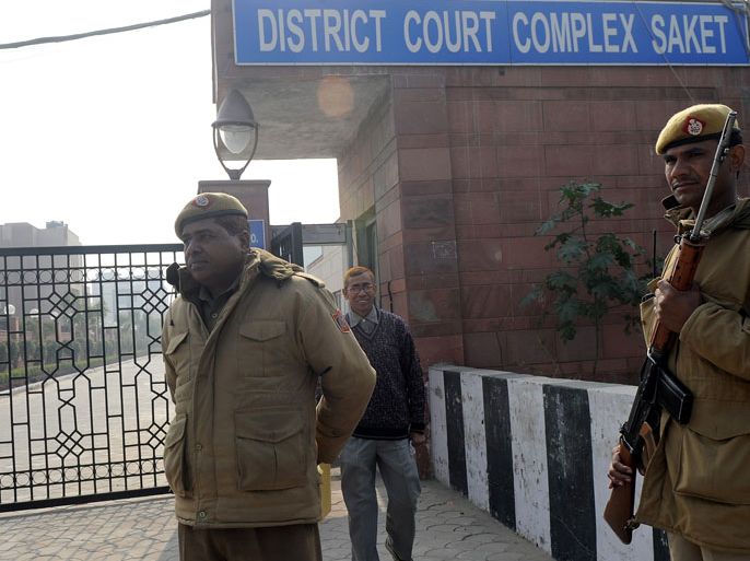 INDIA : Indian police personnel stand guard outside the district court Saket in New Delhi on January 5, 2013. Claims of police incompetence and public apathy stirred new anger in the Delhi gang-rape case after the boyfriend of the victim recounted details of the savage attack for the first time. The man was the only witness to the gang-rape of his girlfriend by six men on a moving bus on December 16 which has stirred sometimes violent protests against the treatment of women in Indian society and an apparent rise in sex crime. AFP PHOTO/ Prakash SINGH