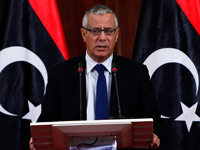 Libyan Prime Minister Ali Zeidan speaks during a news conference at the headquarters of the Prime Minister's Office in Tripoli January 16, 2013. REUTERS/Ismail Zitouny (LIBYA - Tags: POLITICS)