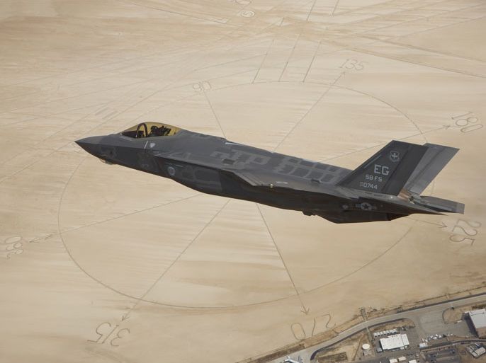 The second production model F-35A Lightning II aircraft flies above the compass rose of Rogers Dry Lakebed at Edwards Air Force Base, California in this image distributed by the U.S. Air Force dated May 13, 2011. Singapore could order its first F-35 fighter jets in 2013, a top executive with plane maker Lockheed Martin Corp said November 8, 2012, as Washington encourages weapons exports to boost ties with its allies.