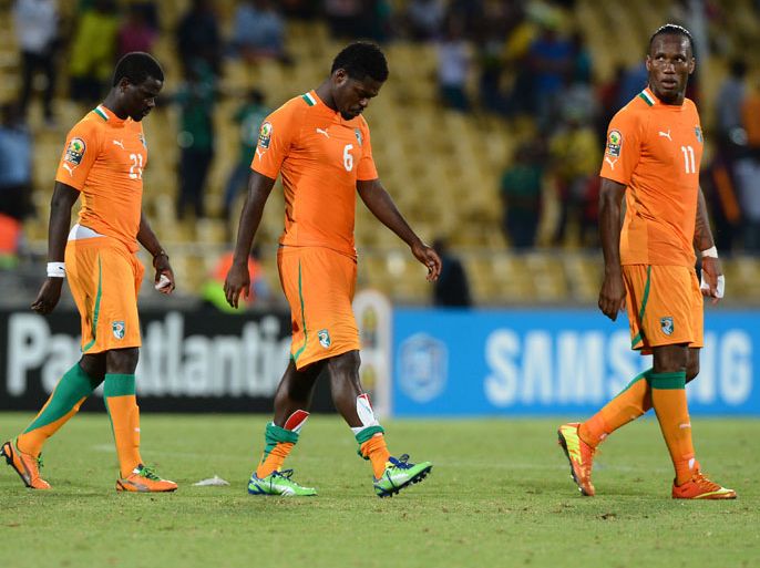 Ivory Coast's forward Didier Drogba (R) reacts at the end of the African Cup of Nation 2013 quarter final football match Ivory Coast vs Nigeria, on February 3, 2013 in Rustenburg. Nigeria won 2-1. AFP PHOTO / FRANCISCO LEONG