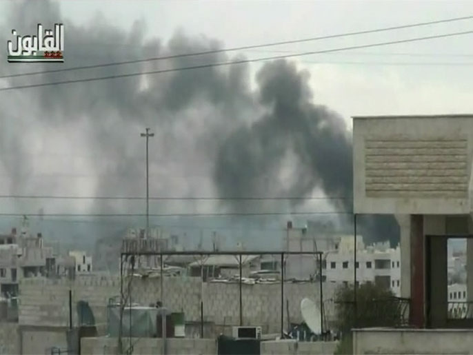 ‪قصف سابق لأحياء في دير الزور من قبل قوات النظام‬ (الجزيرة)