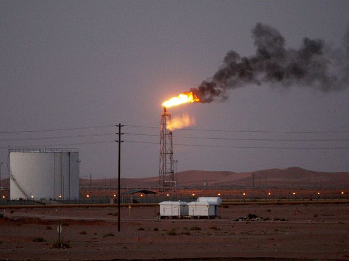 A gas flame seen in the desert at Khurais oil field, about 160 km from Riyadh, Kingdom of Saudi Arabia, 23 June 2008. A top executive at Saudi Aramco said that the company's plans are on track for its Khurais project south of Riyadh which puts put 1.2 million barrels per day (bpd), Gulf Daily News reported. A statement said the project is valued at $10 billion and would be on time giving another major boost to capacity from the Khursaniyah oil field. The processing facility will handle oil from the Abu Jifan and Mazalij fields, as well as Khurais. EPA/ALI HAIDER