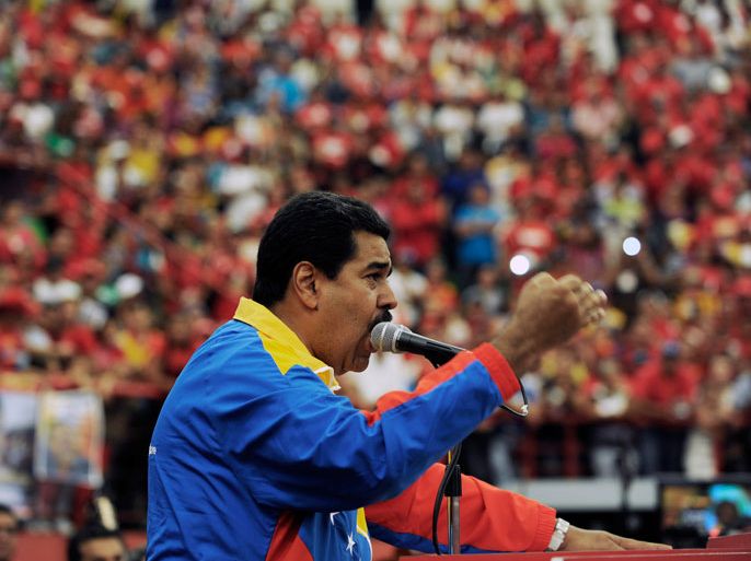 Venezuelan acting president Nicolas Maduro delivers a speech during a campaign rally in the state of Barinas, Venezuela on March 30, 2013, ahead of the presidential election on April 14. AFP PHOTO/JUAN BARRETO
