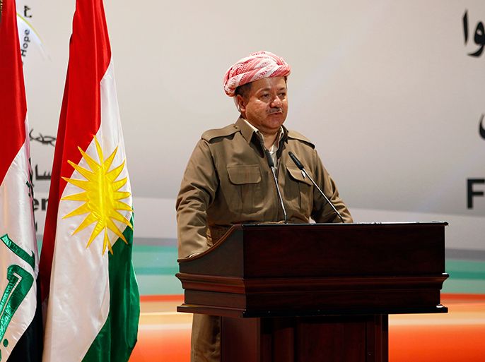 Masoud Barzani, president of Iraq's autonomous Kurdistan region, addresses the opening of a conference on "Recognizing Kurdish Genocide" in Arbil, about 350 km (217 miles) north of Baghdad, March 14, 2013. REUTERS/Thaier al-Sudani (IRAQ - Tags: CIVIL UNREST POLITICS)