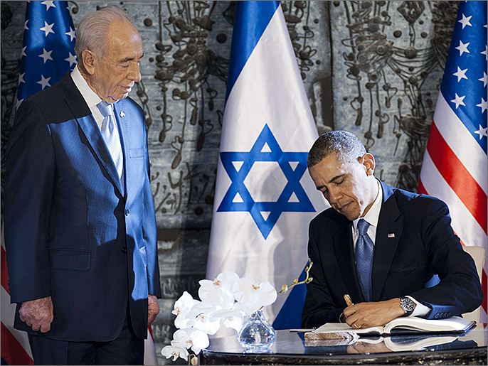 أوباما مع الرئيس الإسرائيلي شمعون بيريز (الفرنسية)