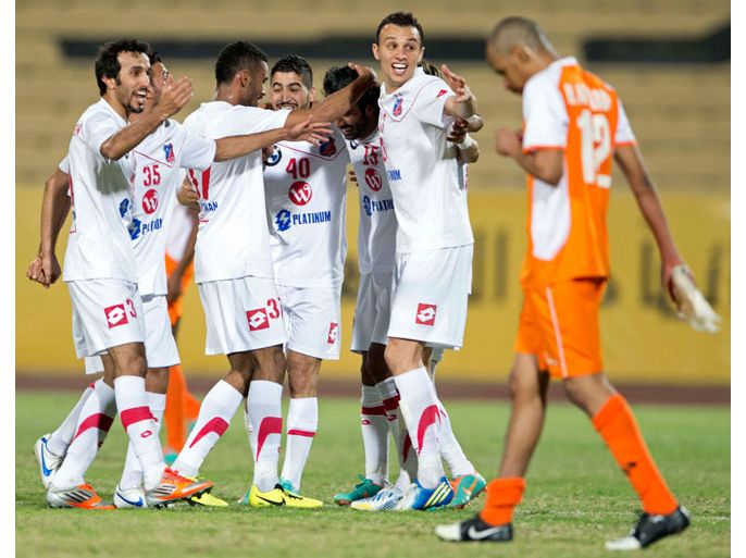 Al Kuwait's players celebrate a goal during their Kuwaiti Premier League soccer match against Kazma in Kuwait city March 29, 2013. REUTERS/Tariq AlAli (KUWAIT - Tags: SPORT SOCCER)