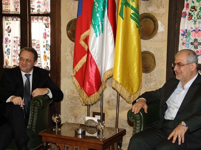 Russian Special Envoy Mikhail Bogdanov (L) meets with Hezbollah member of parliament Mohammad Raad in Beirut on April 26, 2013. AFP