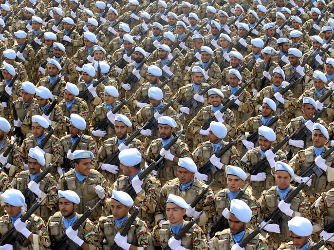 epa03666486 Iranian Army soldiers march during a ceremony marking the annual National Army Day in Tehran, Iran, 18 April 2013. Iranian President Mahmoud Ahmadinejad said 18 April that his country was ready for both tackling military confrontations as well as securing peace. 'It is a source of strength that we can now say we are ready confronting (military threats by) world powers not afraid of them,' Ahmadinejad said in a televised speech during a military parade in Tehran. EPA/STR