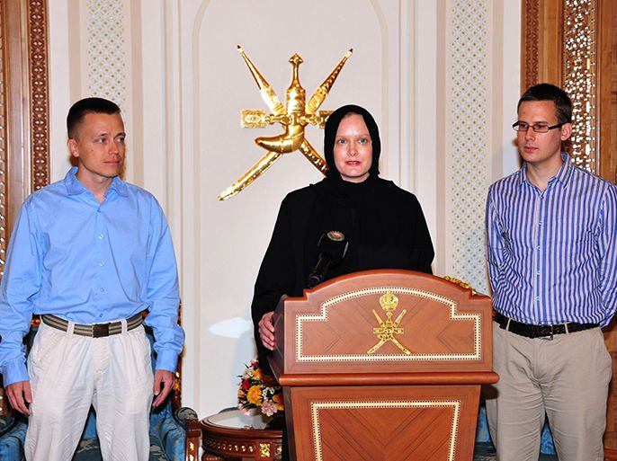 A Finnish couple and an Austrian student abducted in Yemen by Al-Qaeda militants stand on May 9, 2013 at the airport of the Omani capital Muscat after they were handed over to Omani authorities following their release. The three Europeans, seized in Sanaa on December 21, were freed by local tribesmen on the border with Oman overnight, an Yemeni official said. AFP PHOTO/STR