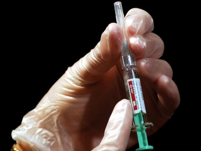 ‪تطعيم فيروس 