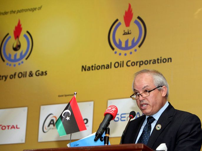epa03672744 Libyan Oil Minister Abdelbari al-Arusi speaks during the opening of the International Exhibition and Conference for the Regeneration of Libya's Oil, Gas and Petrochemicals Sector, in Tripoli, Libya, 22 April 2013. The four-day conference and exhibition brings together leading companies providing equipment, materials, products, technology and services for the expansion, upgrading and modernization of the Libyan petrochemical infrastructure. EPA/SABRI ELMHEDWI