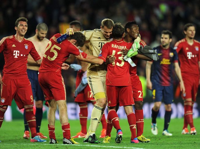 SPAIN : Bayern Munich's players celebrate their victory at the end of the UEFA Champions League semi-final second leg football match FC Barcelona vs FC Bayern Munich at the Camp Nou stadium in Barcelona on May 1, 2013. Bayern Munich won the match 3-0. AFP PHOTO / LLUIS GENE